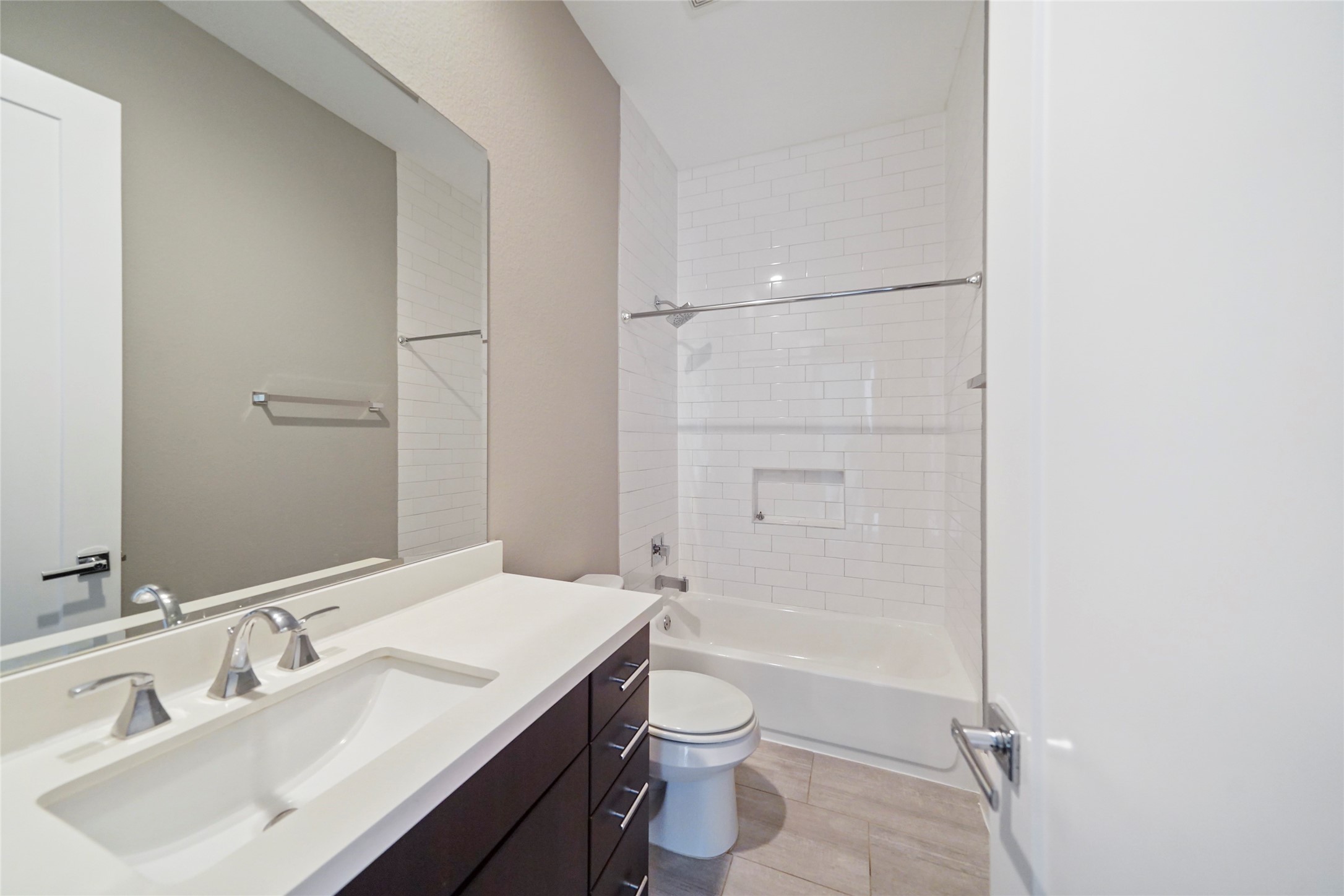 4123 Eigel Street Houston, TX 77007 - Photo 22 of 25 a bathroom with a sink a toilet and shower
