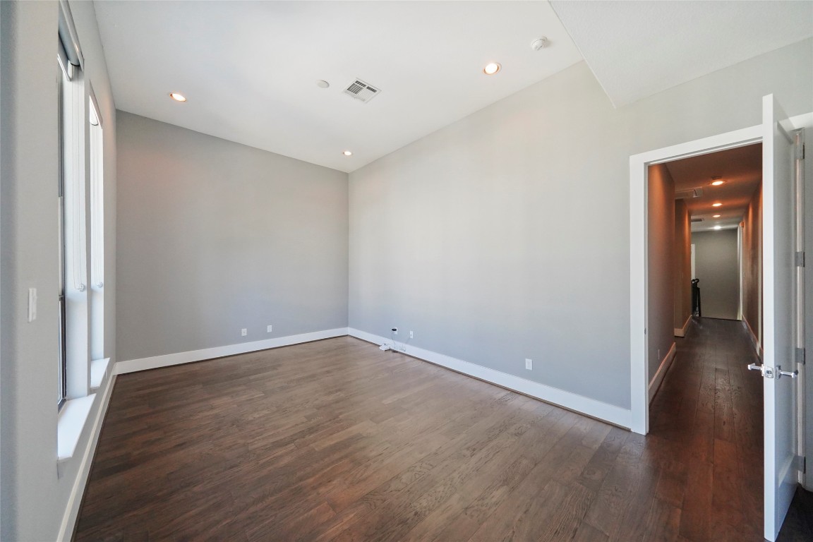 4123 Eigel Street Houston, TX 77007 - Photo 25 of 25 wooden floor in an empty room with a window