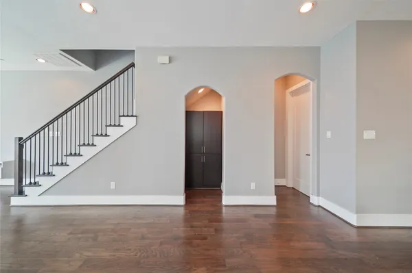 a view of an entryway with wooden floor