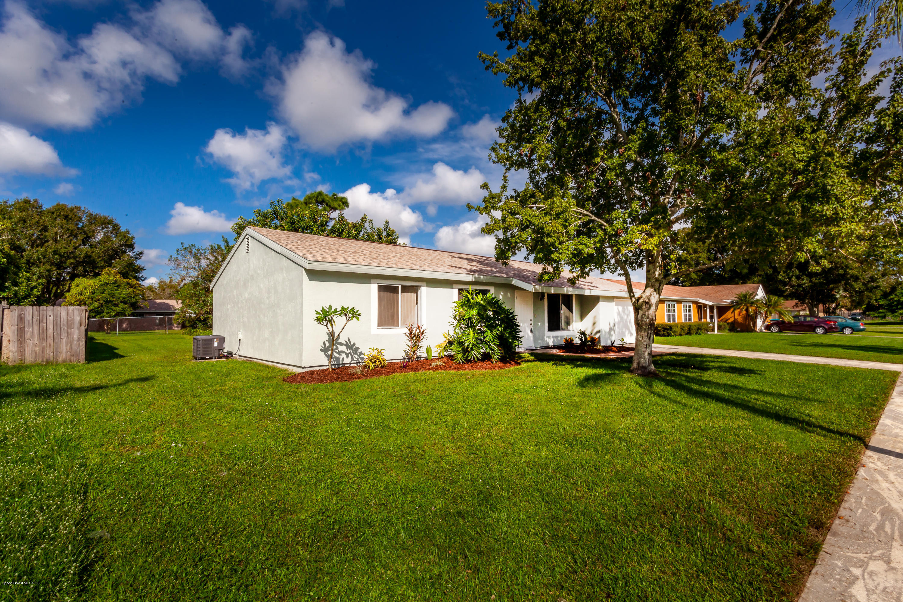 1280 Freil Road Northeast Palm Bay, FL 32905 - Photo 14 of 15 a view of a house with a back yard