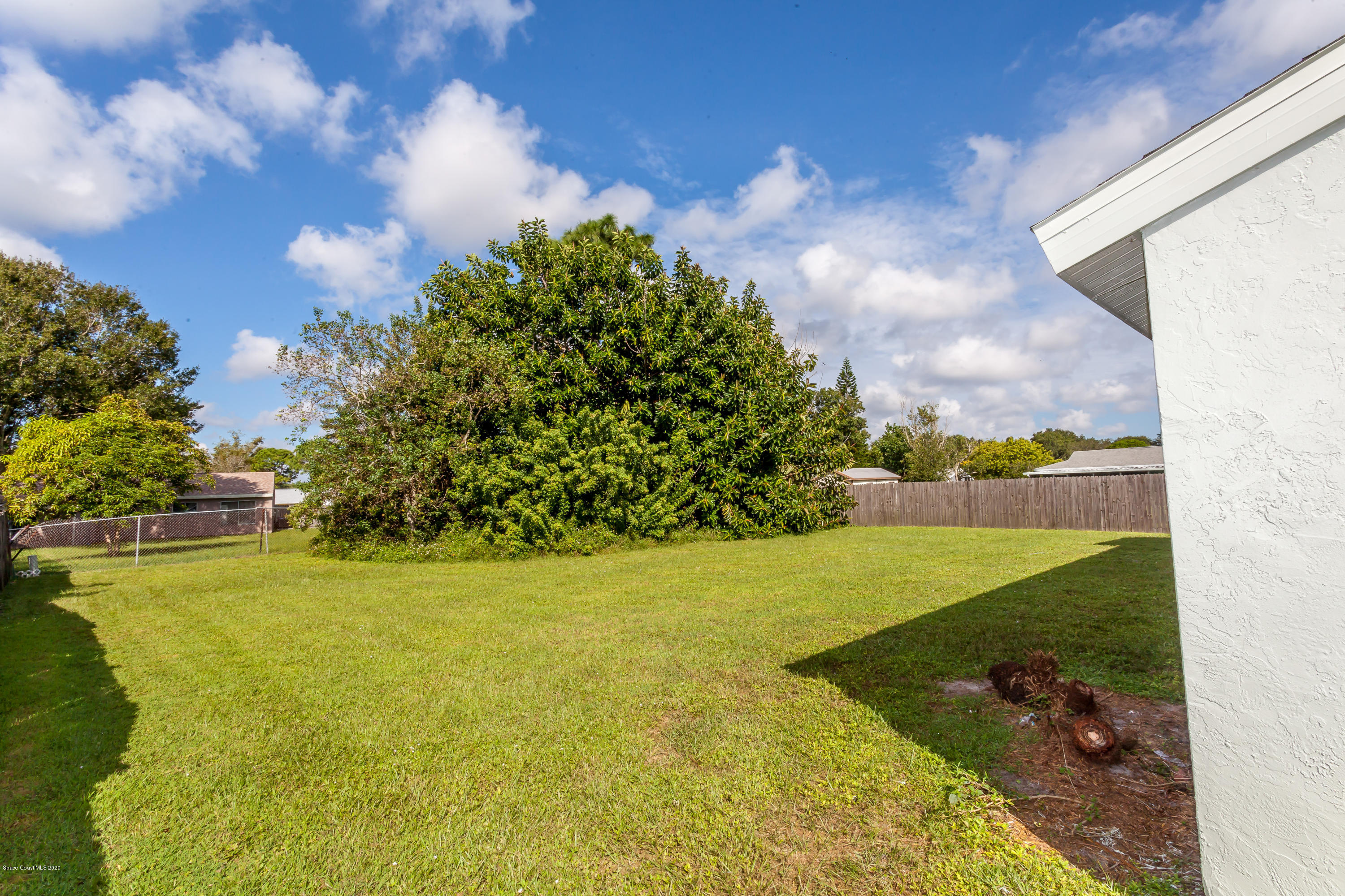 1280 Freil Road Northeast Palm Bay, FL 32905 - Photo 15 of 15 a view of yard with outdoor seating