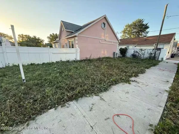 a view of a backyard with plants
