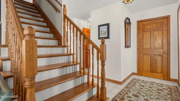 a view of an entryway with staircase