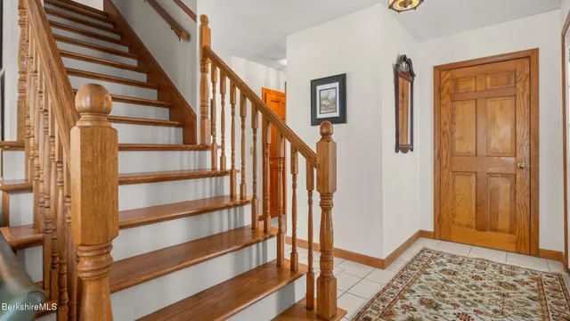 a view of an entryway with staircase