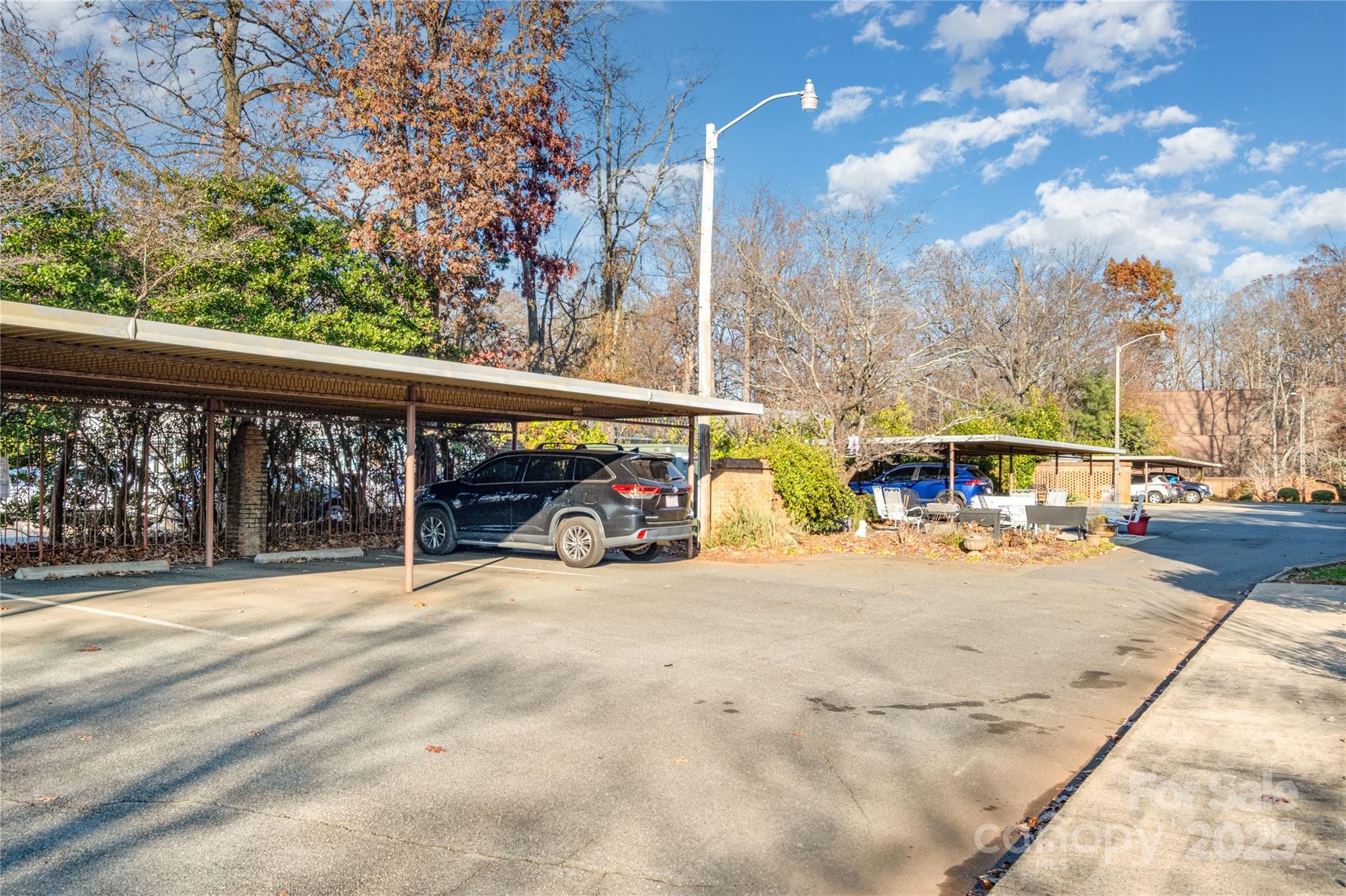 4527 Gaynor Road, Unit 303 Charlotte, NC 28211 - Photo 25 of 28 a view of outdoor space with seating area