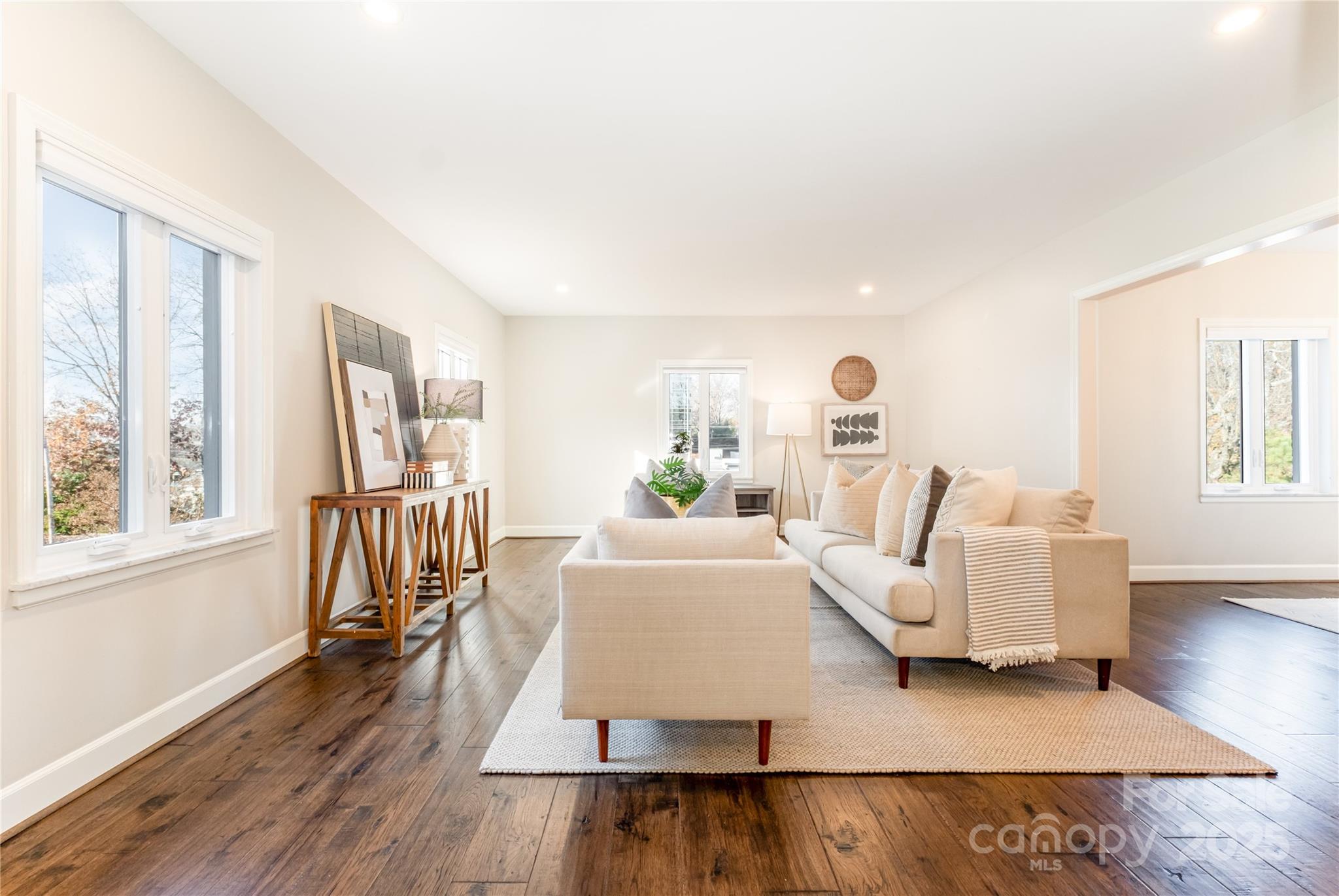 4527 Gaynor Road, Unit 303 Charlotte, NC 28211 - Photo 10 of 28 a living room with furniture and a table