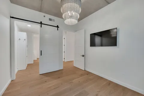 a view of a livingroom with wooden floor
