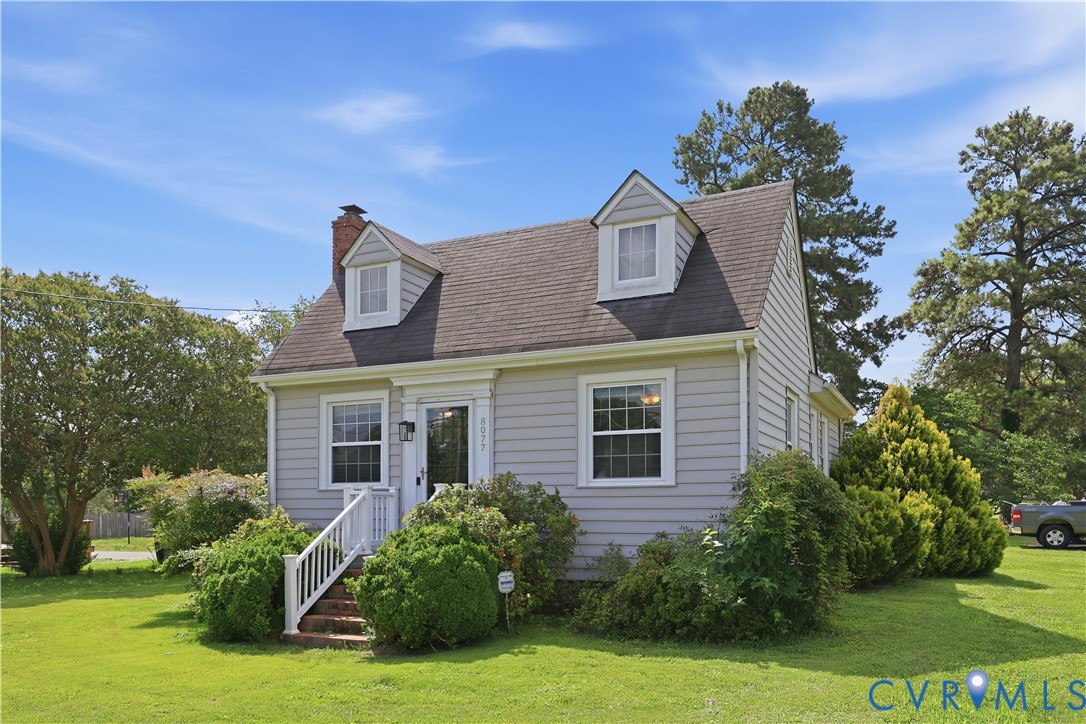 8077 Signal Hill Road Mechanicsville, VA 23111 - Photo 3 of 24 Light gray siding residence with a dark shingled r