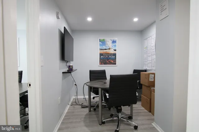 a view of a workspace with furniture