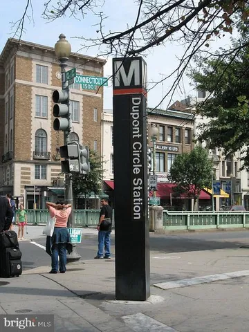 a view of a street with cars