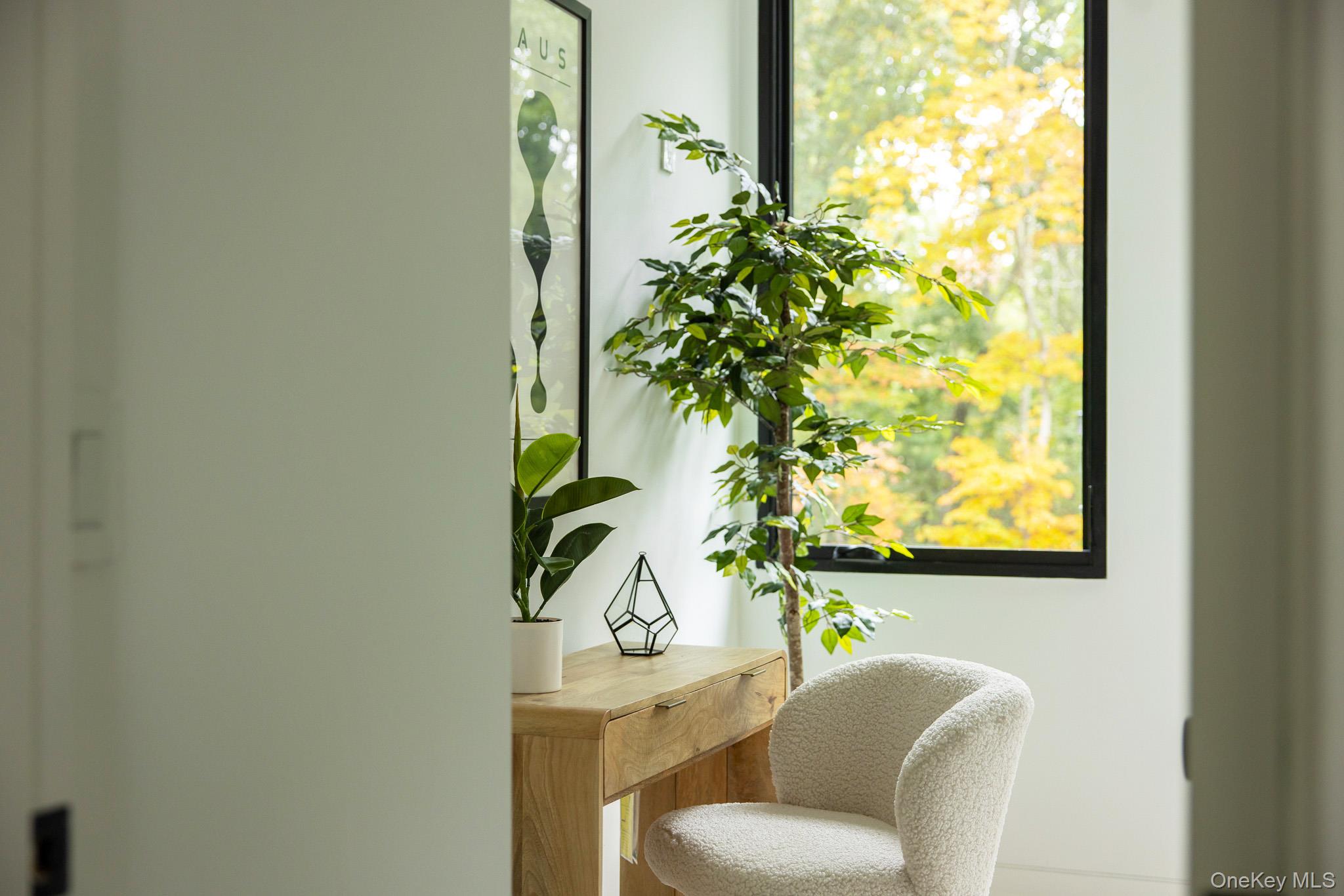 283 Willow Glen Road Red Hook, NY 12571 - Photo 16 of 27 a dining room with furniture and a potted plant