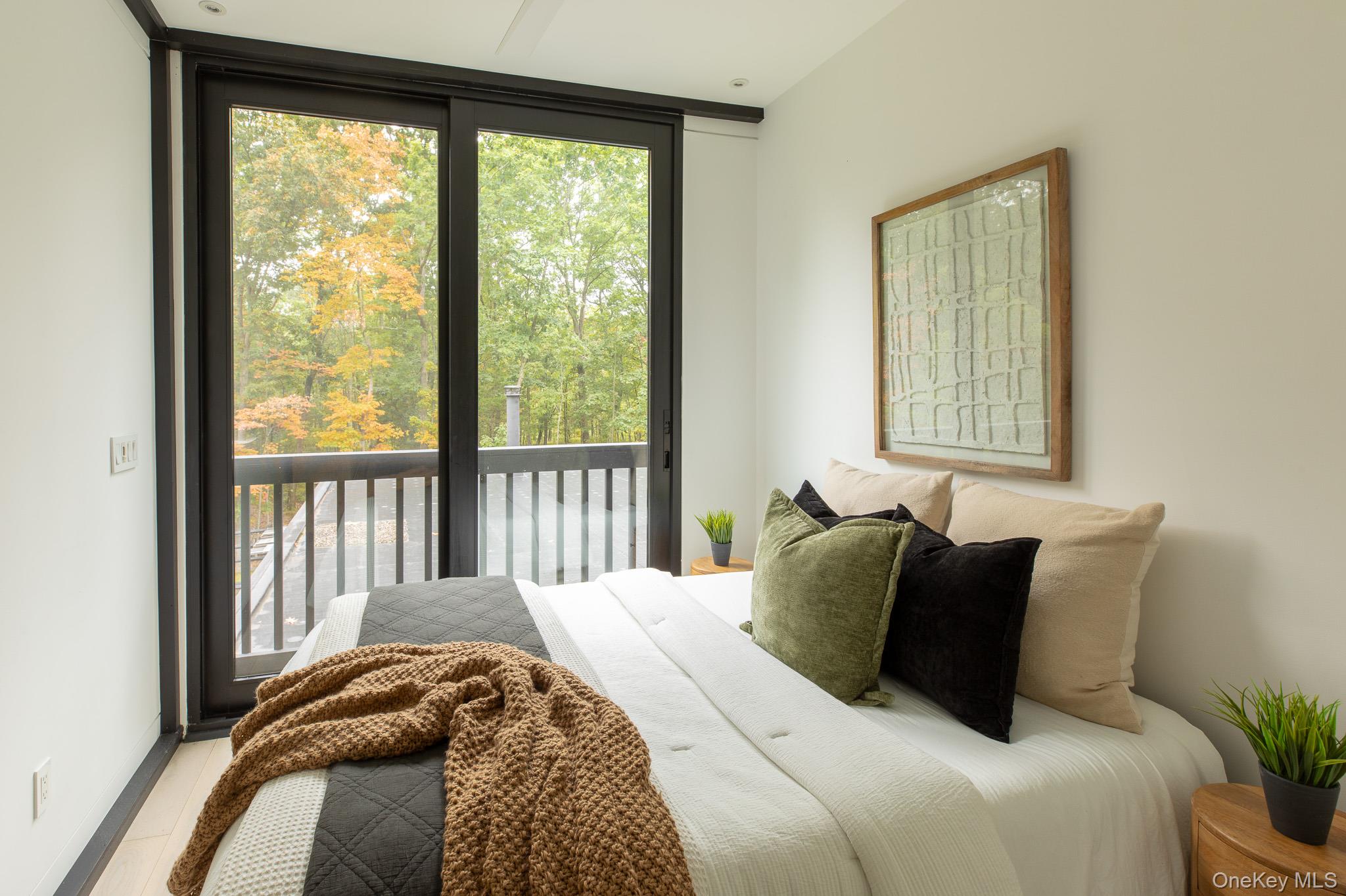 283 Willow Glen Road Red Hook, NY 12571 - Photo 21 of 27 a bedroom with a bed and a window