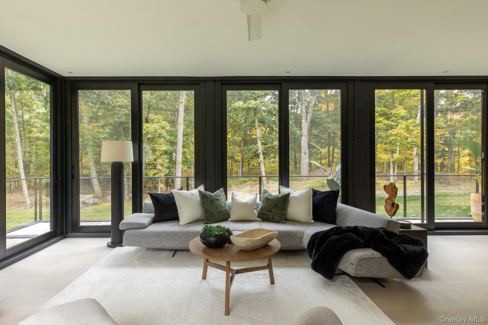 283 Willow Glen Road Red Hook, NY 12571 - Photo 7 of 27 a living room with furniture and a large window