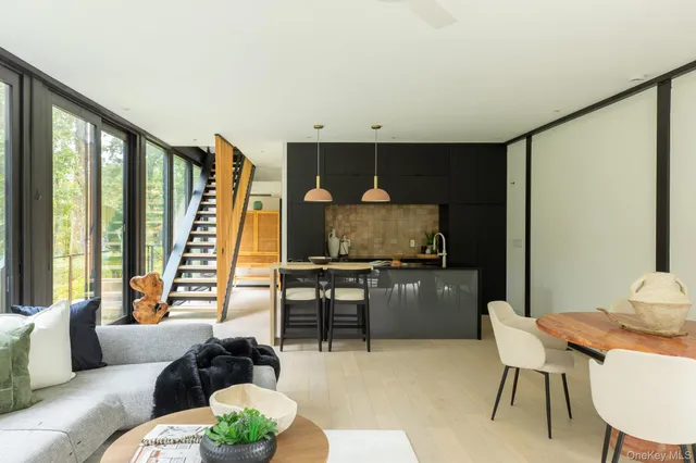 a kitchen with a sink cabinets and a table