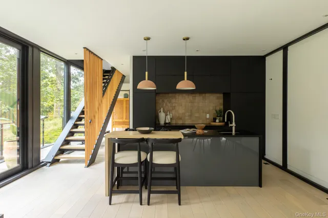 a room with furniture and a large window