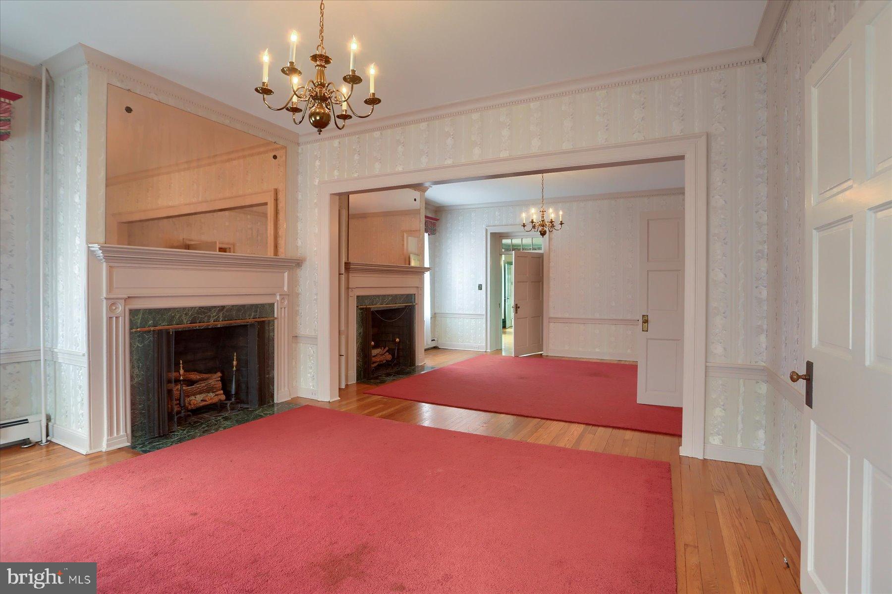 40 North Market Street Millerstown, PA 17062 - Photo 10 of 39 a bedroom with a bed and a fireplace