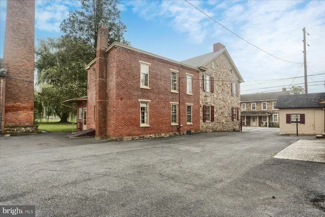 a view of a house with a street