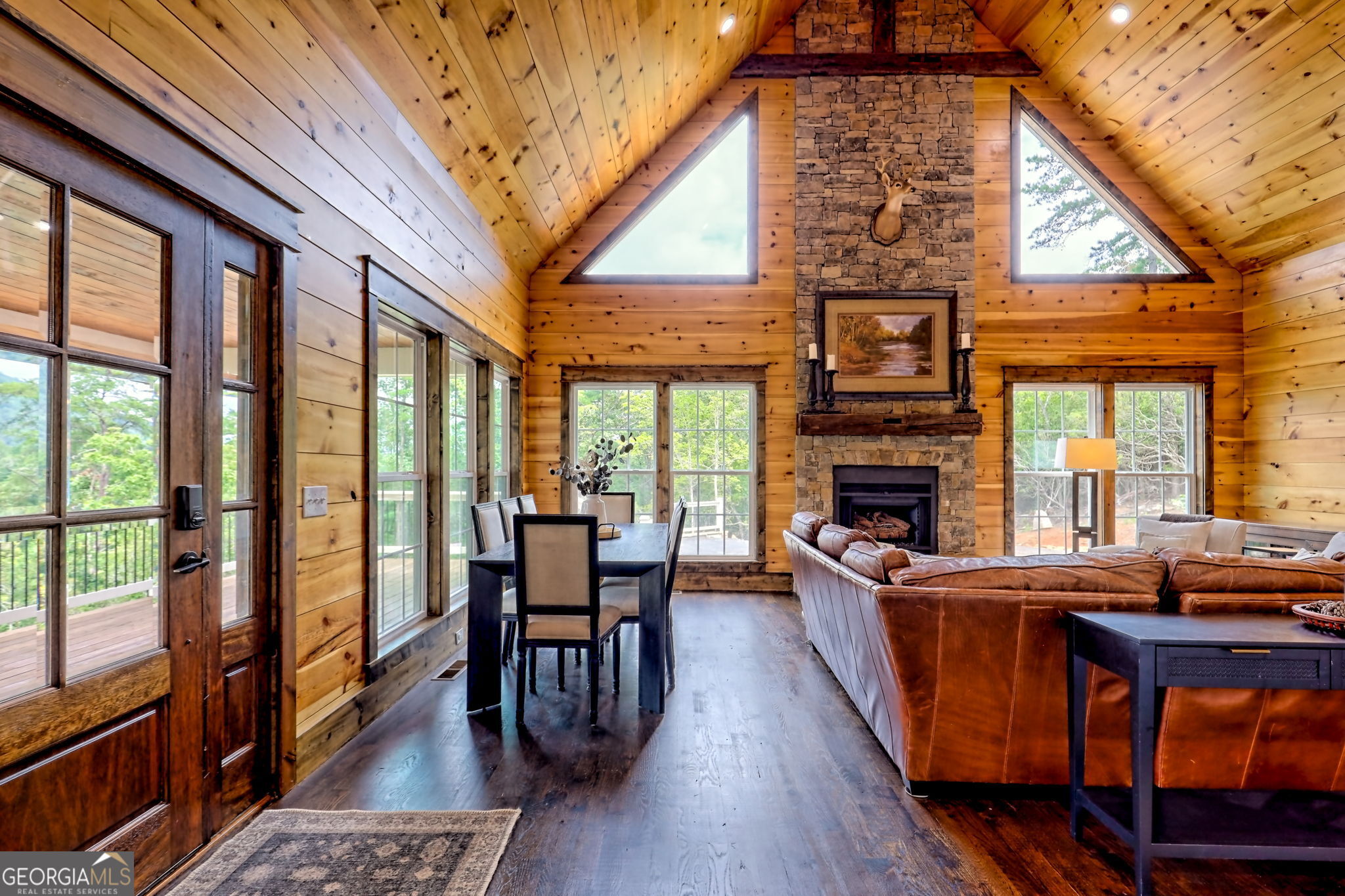 63 Redwood Lane Tiger, GA 30576 - Photo 13 of 84 a view of a dining room with furniture window and wooden floor