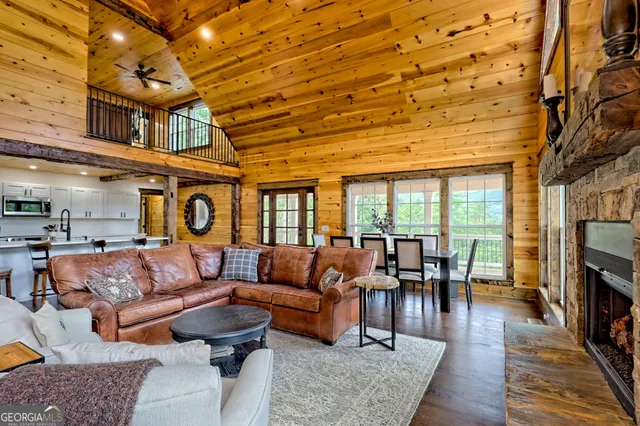 a en suite bathroom with a granite countertop sink and a mirror