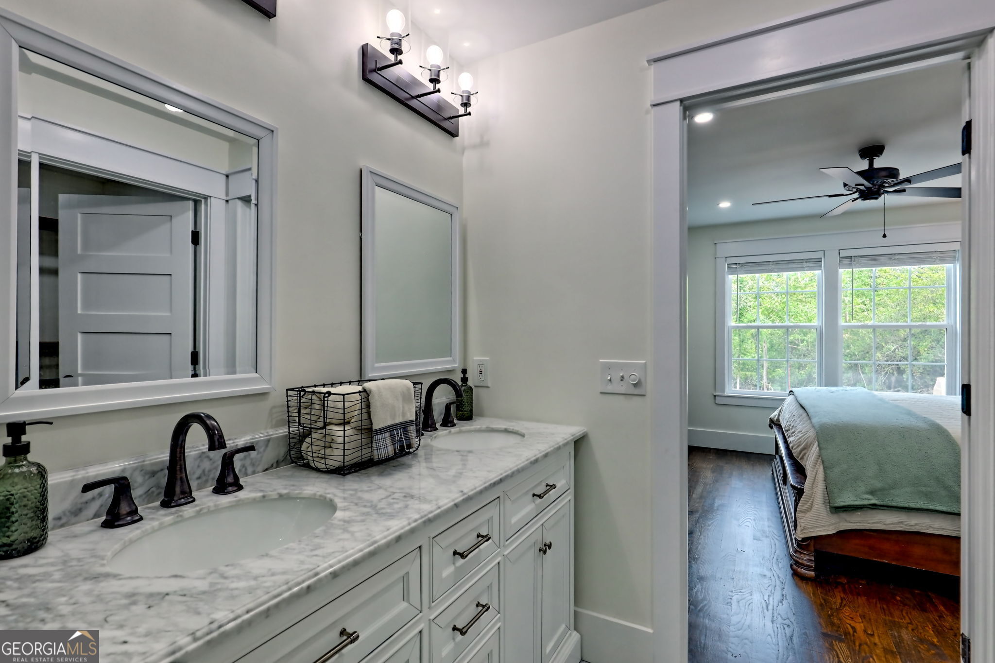 63 Redwood Lane Tiger, GA 30576 - Photo 36 of 84 a en suite bathroom with a granite countertop sink and a mirror