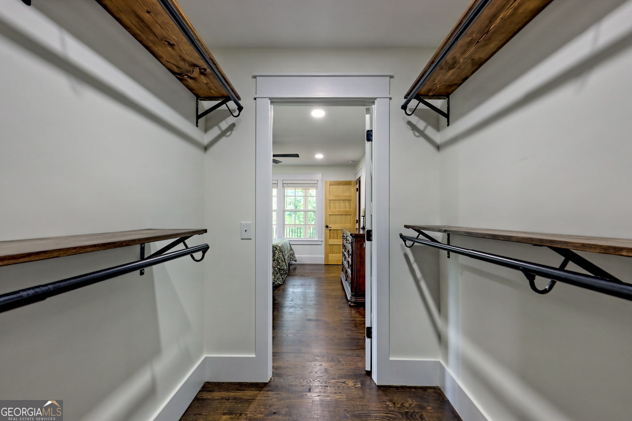 63 Redwood Lane Tiger, GA 30576 - Photo 42 of 84 a view of a hallway with wooden floor and staircase