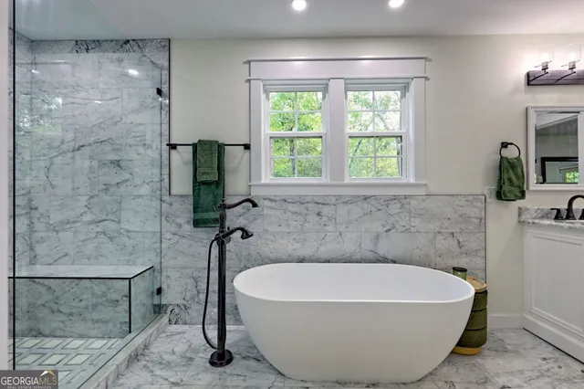 a backyard of a house with seating space