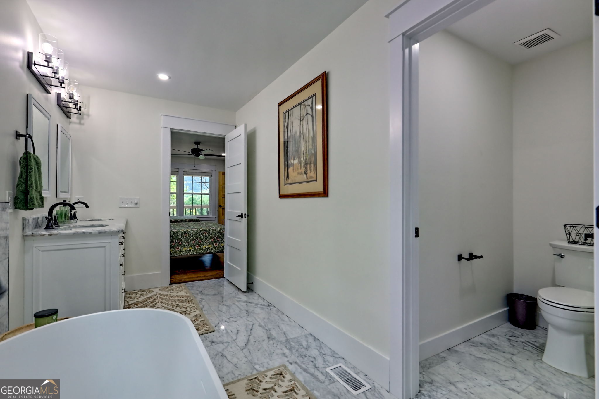 63 Redwood Lane Tiger, GA 30576 - Photo 47 of 84 a spacious bathroom with a sink a toilet and shower