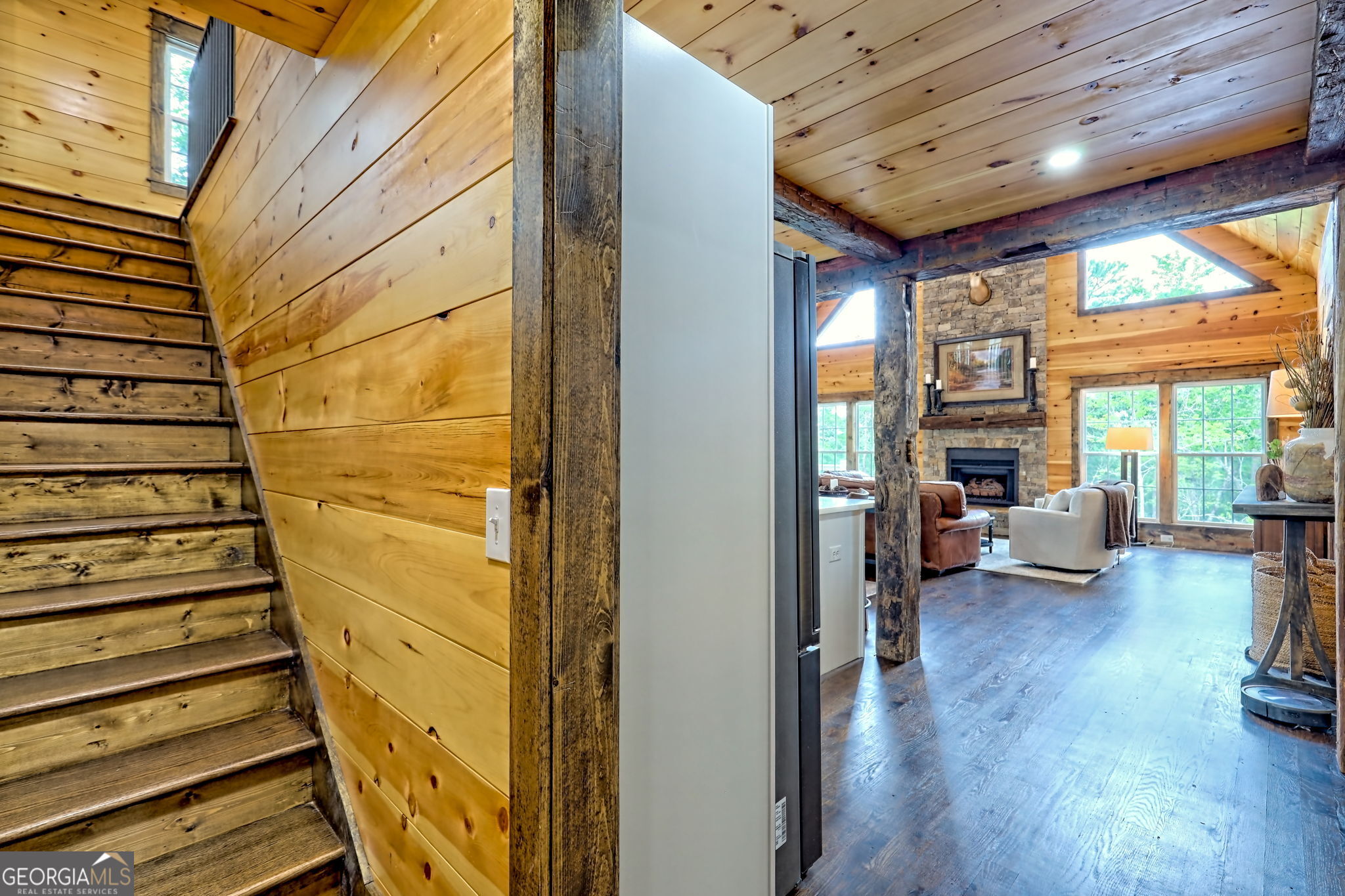63 Redwood Lane Tiger, GA 30576 - Photo 50 of 84 a view of a livingroom with furniture staircase and a living room