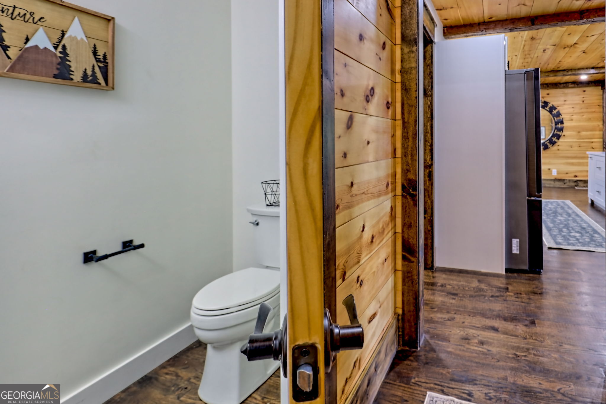 63 Redwood Lane Tiger, GA 30576 - Photo 68 of 84 a bathroom with a toilet and a shower