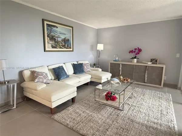 a living room with furniture and a couch