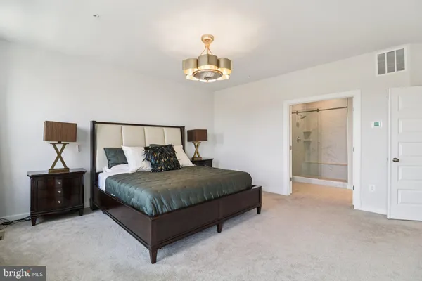 a view of a bedroom with closet area