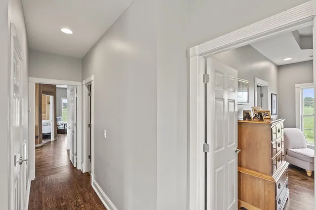 a bedroom with furniture and windows