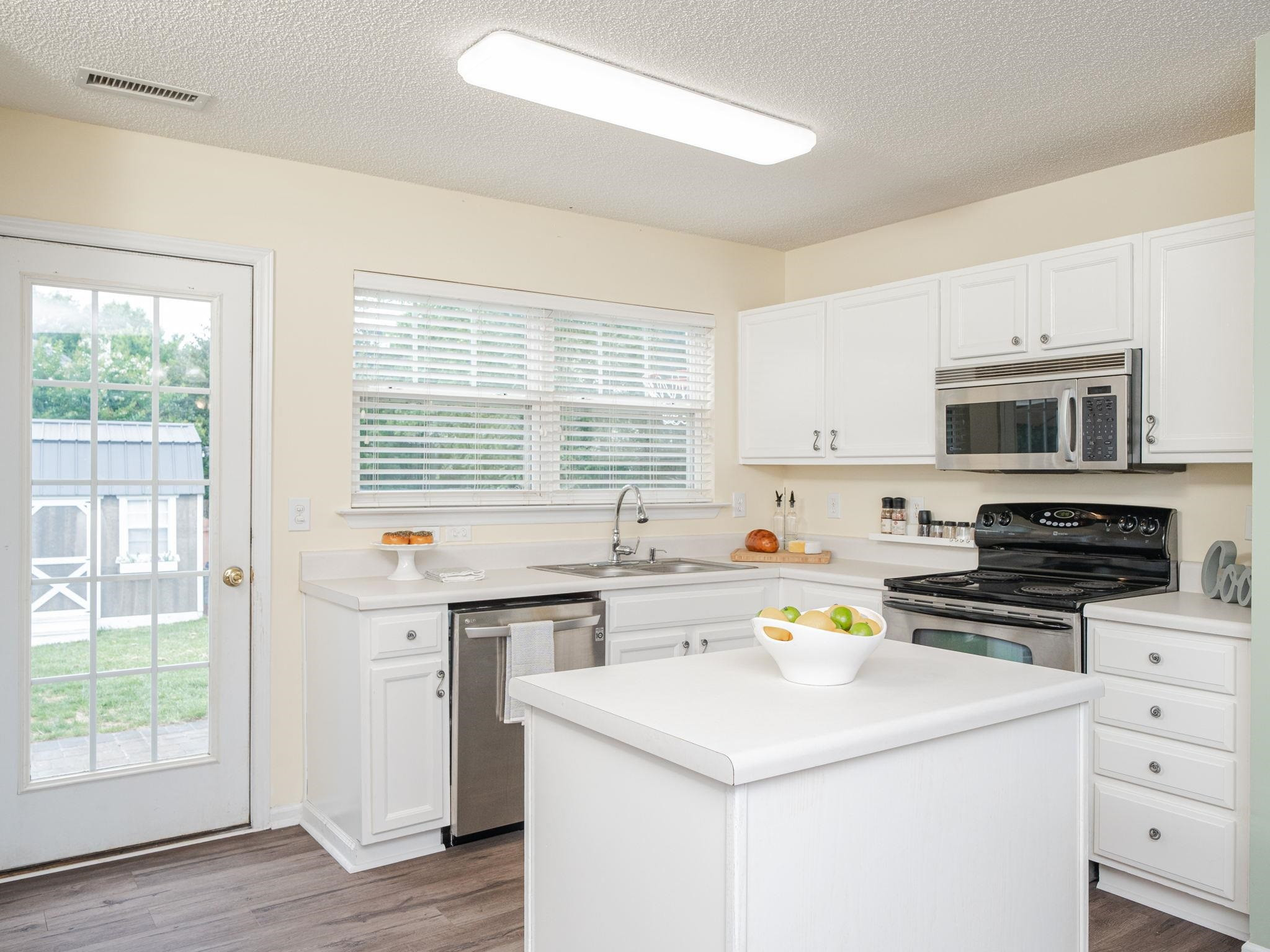4117 Hopper Street Raleigh, NC 27616 - Photo 9 of 30 Bright Kitchen