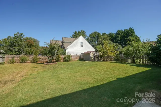 a house with trees in the background