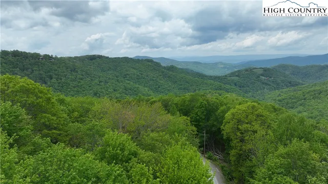 a view of a city and mountains