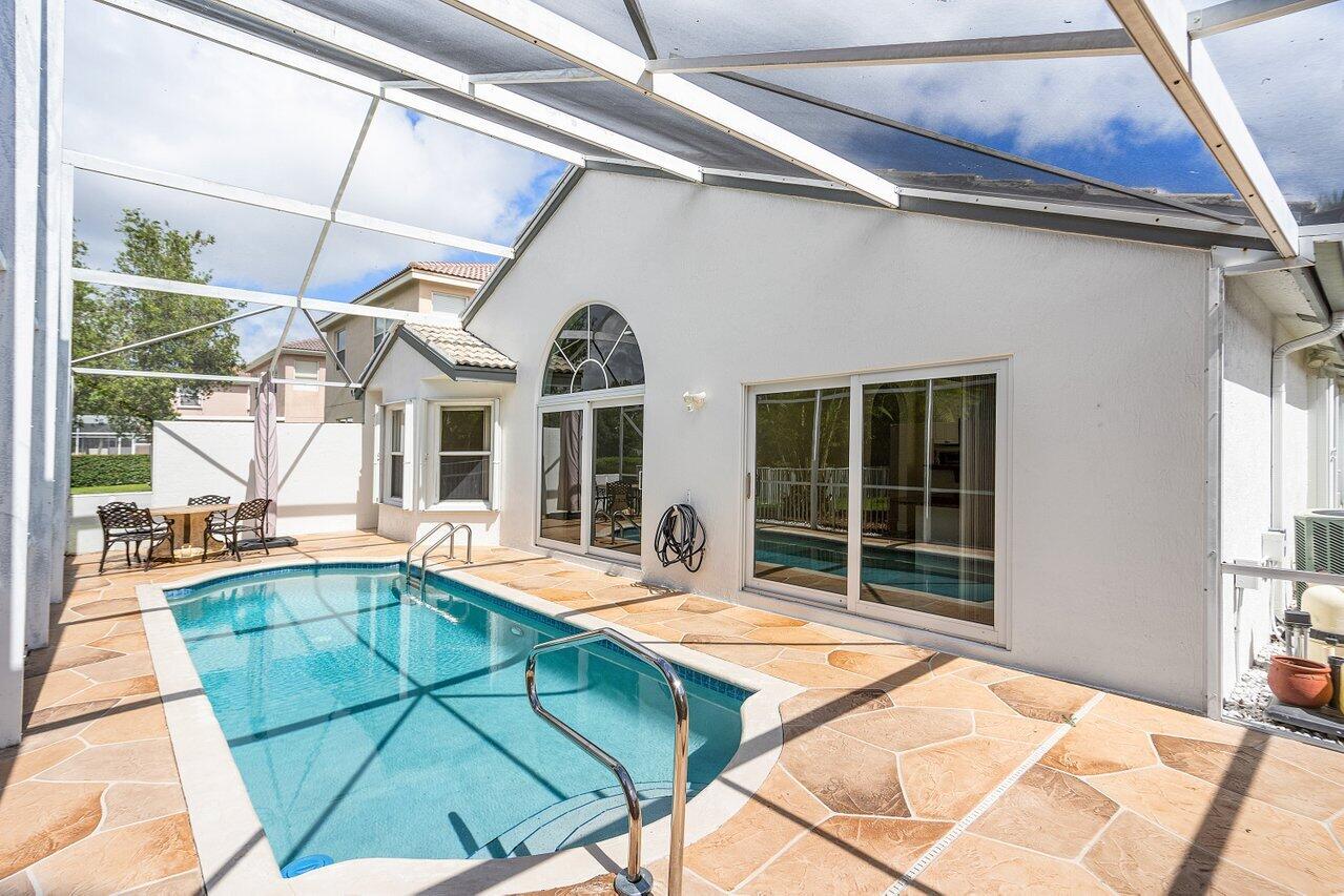 9547 Fox Trot Lane Boca Raton, FL 33496 - Photo 2 of 38 a view of a house with sitting area
