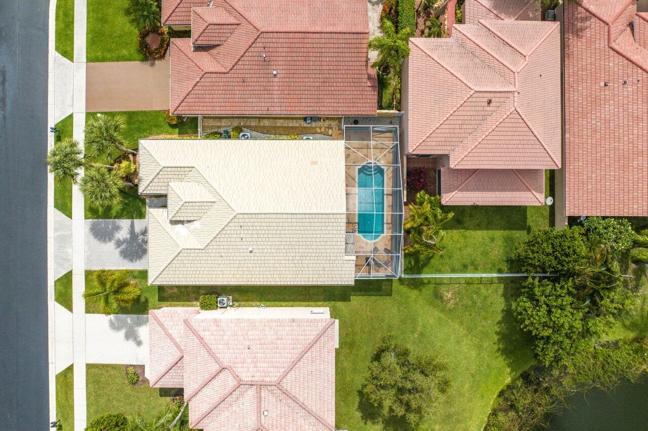 9547 Fox Trot Lane Boca Raton, FL 33496 - Photo 30 of 38 an aerial view of a house with a swimming pool