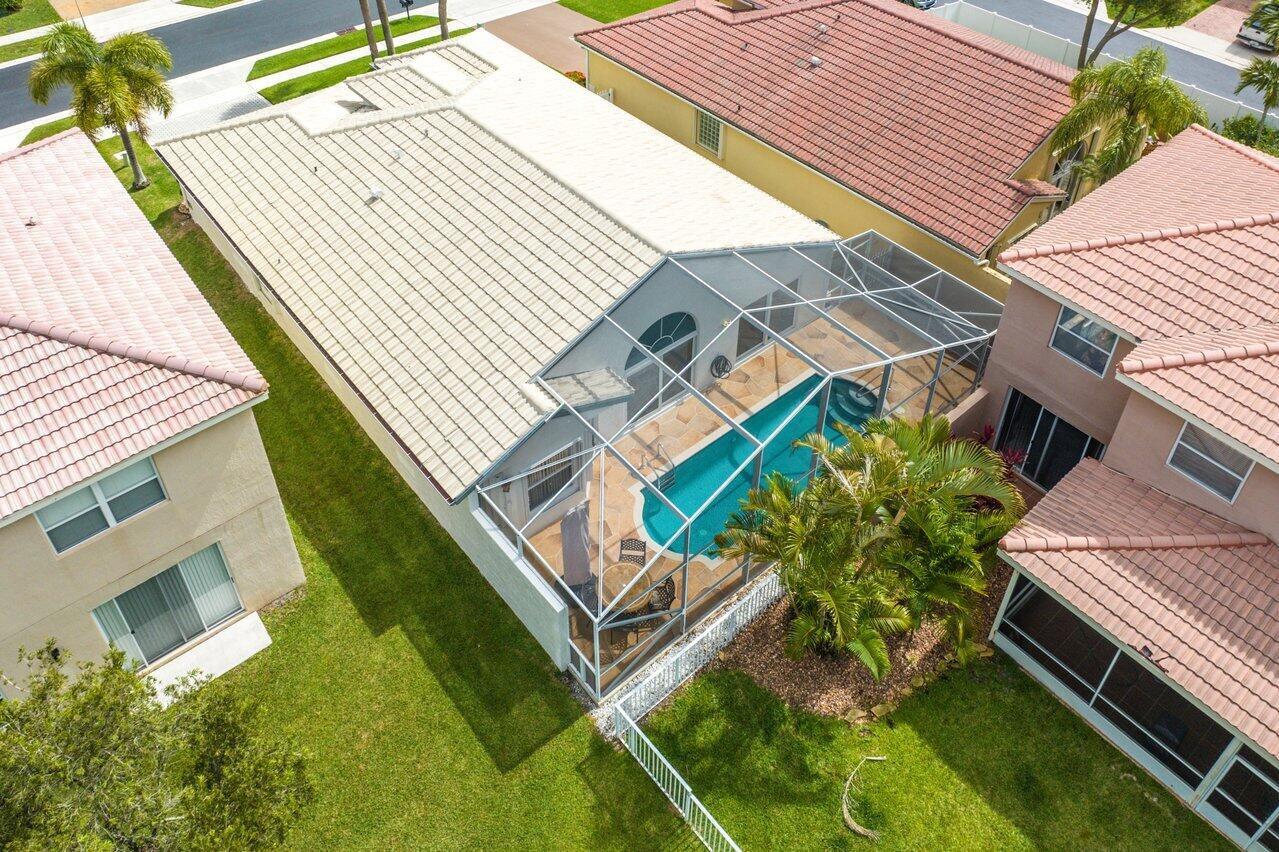 9547 Fox Trot Lane Boca Raton, FL 33496 - Photo 31 of 38 an aerial view of a house with a yard