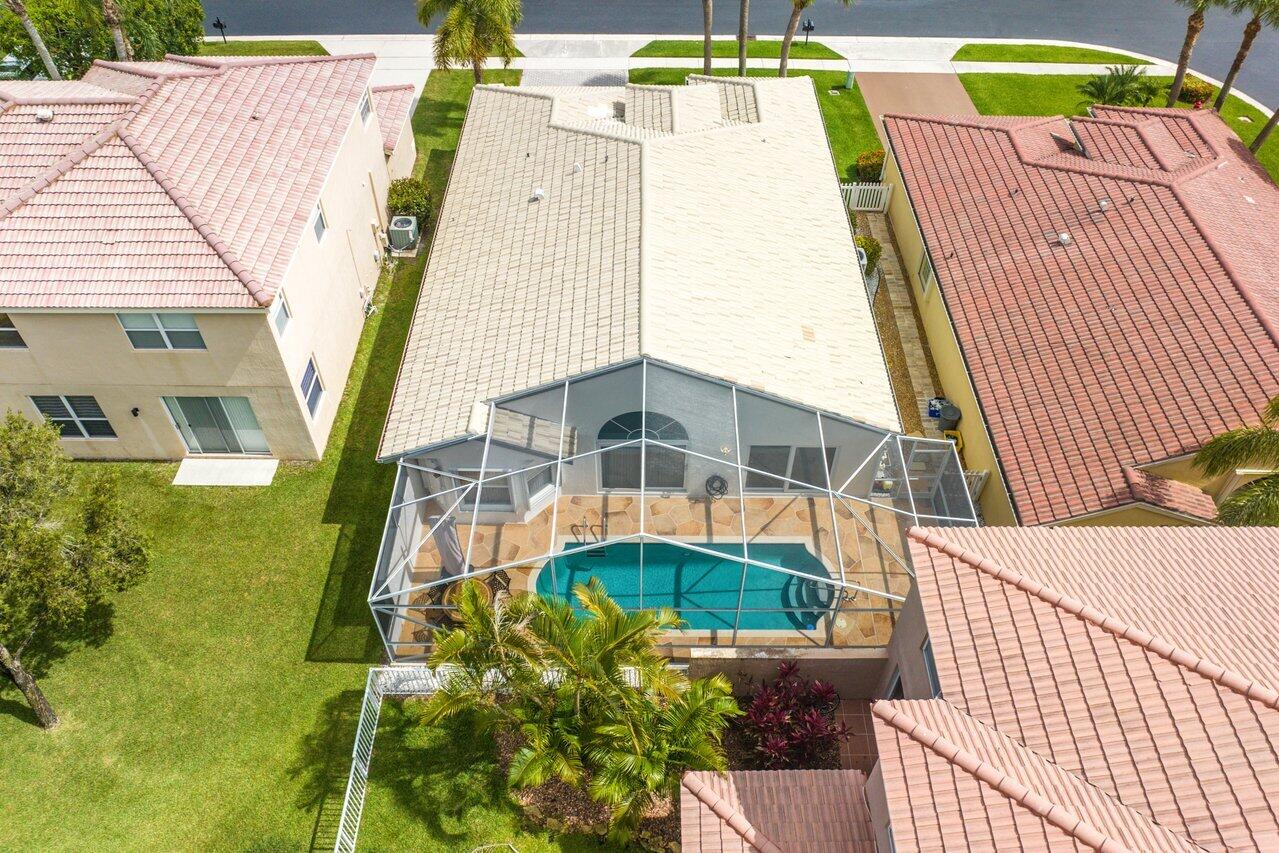 9547 Fox Trot Lane Boca Raton, FL 33496 - Photo 32 of 38 a aerial view of a house with swimming pool