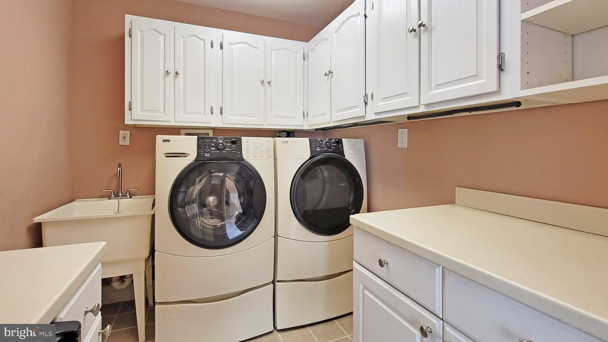 8219 Riding Ridge Place McLean, VA 22102 - Photo 50 of 79 MAIN LEVEL LAUDRY ROOM WITH SINK & MINI FRIDGE