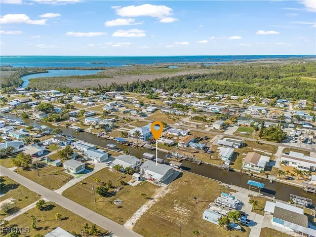 an aerial view of residential building with parking space