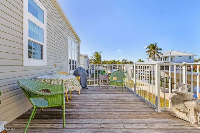 a view of a chairs on the deck