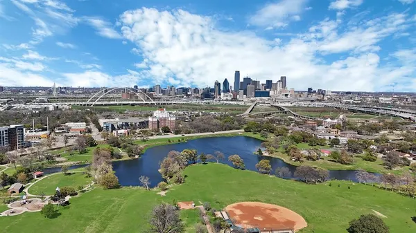 a view of a lake with a city