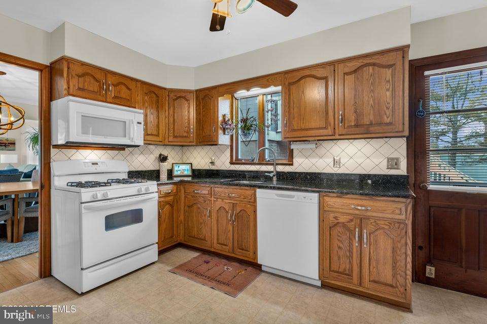 535 Carroll Fox Road Brick, NJ 08724 - Photo 13 of 31 a kitchen with granite countertop appliances cabinets and a sink