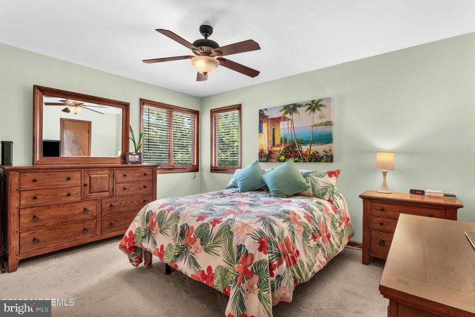 535 Carroll Fox Road Brick, NJ 08724 - Photo 15 of 31 a bed room with a bed and a dresser