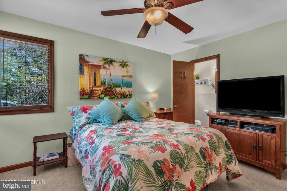 535 Carroll Fox Road Brick, NJ 08724 - Photo 16 of 31 a bedroom with a bed and a flat screen tv