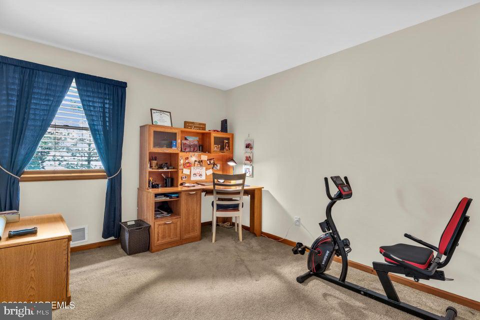 535 Carroll Fox Road Brick, NJ 08724 - Photo 19 of 31 a view of a workspace with furniture and a window