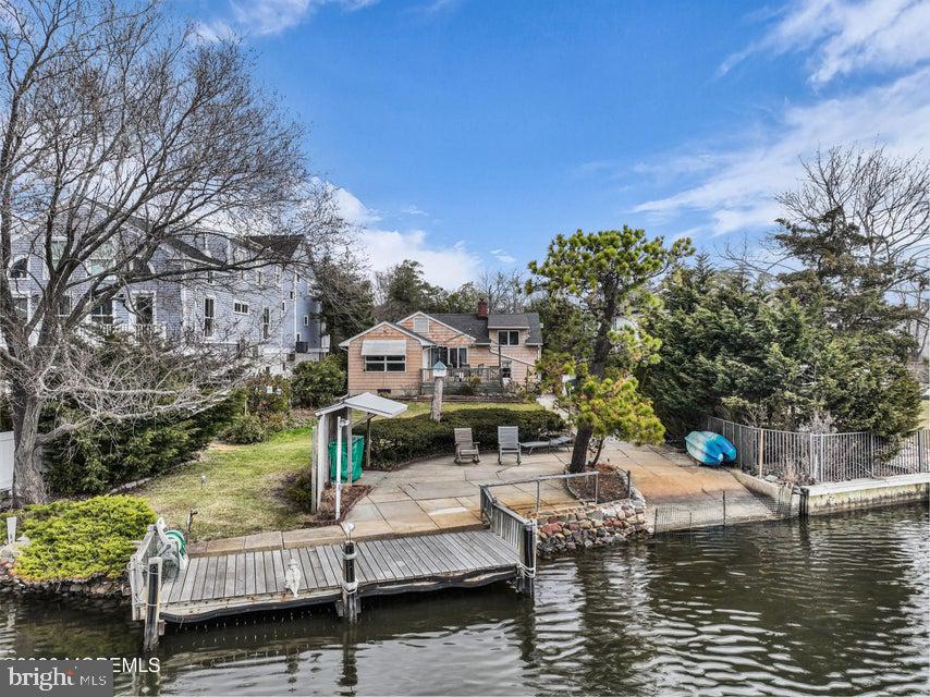 535 Carroll Fox Road Brick, NJ 08724 - Photo 29 of 31 a view of roof deck with chair and wooden floor