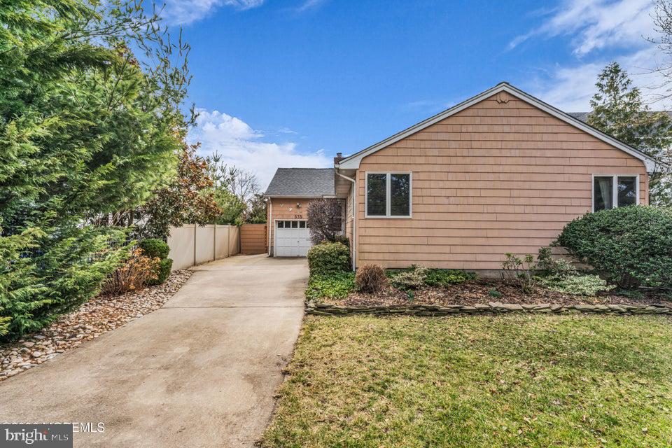 535 Carroll Fox Road Brick, NJ 08724 - Photo 30 of 31 a view of a house with a yard