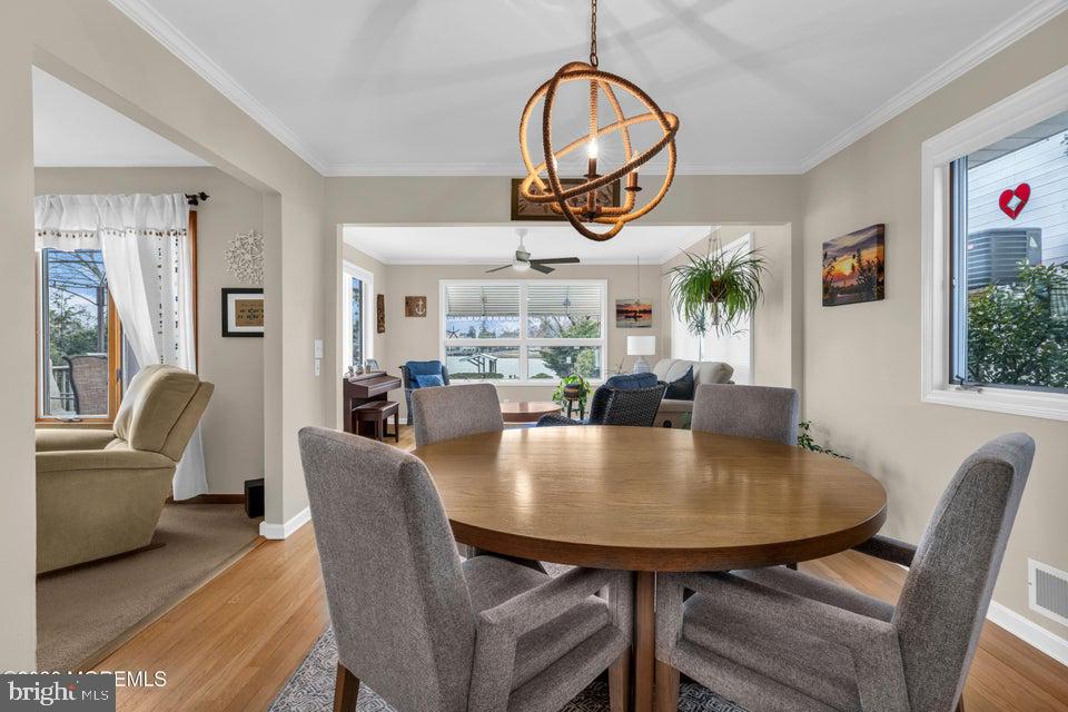 535 Carroll Fox Road Brick, NJ 08724 - Photo 9 of 31 a view of a dining room with furniture window and wooden floor